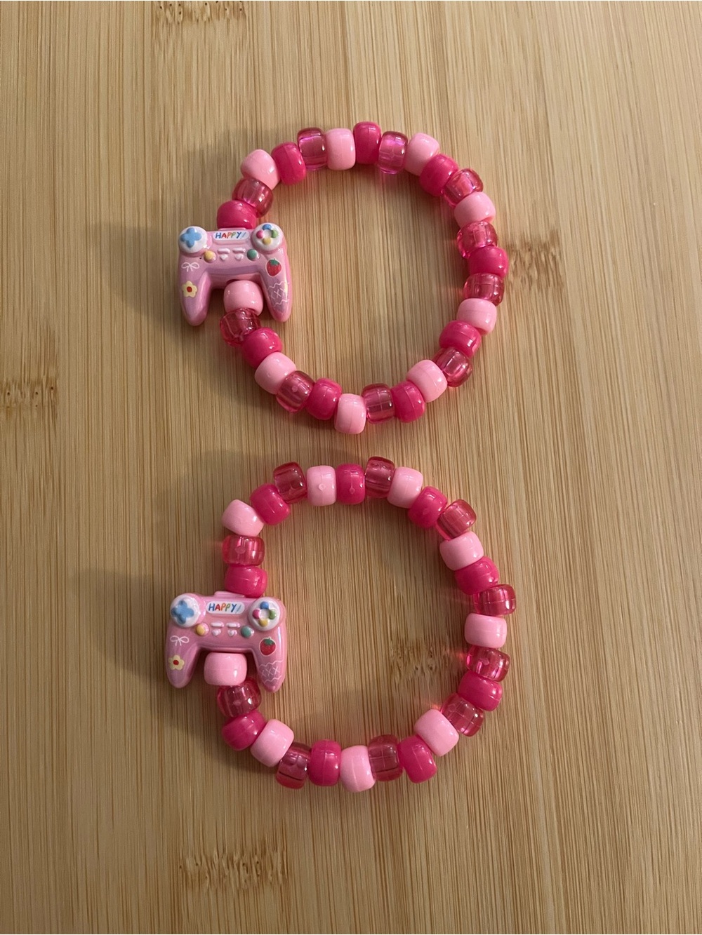 Pink Beaded Elastic Bracelets with Game Controller Charm